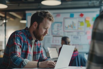 Software Engineer in Open Office Environment Collaborating with Team on Innovative Project