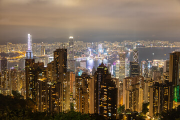 Obraz premium HONG KONG - MAY 5, 2024: Hong Kong city night view from Victoria Peak