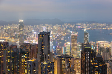 Naklejka premium HONG KONG - MAY 5, 2024: Hong Kong city night view from Victoria Peak