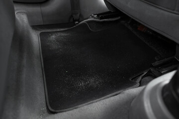 Black soft car floor mat in auto