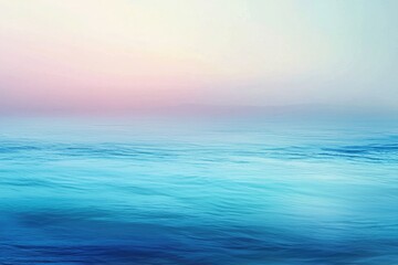 Obraz premium Calm Ocean Water with a Pink and Blue Gradient Sky