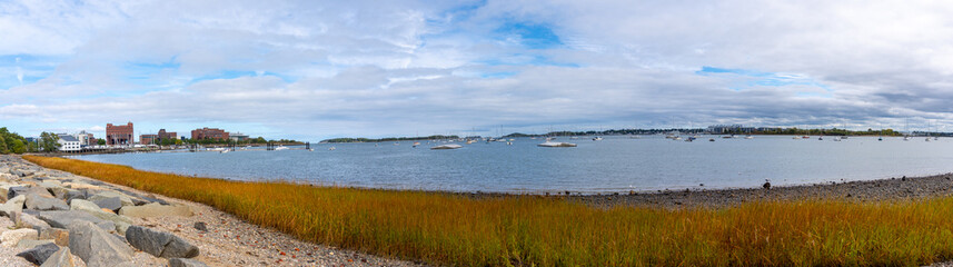 Panoramic View of the Quincy Bay from Shore with many sail boats in the water