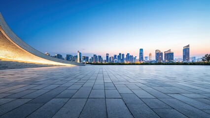 Empty square floor and modern city skyline at dusk with towering skyscrapers and city lights twinkling at evening