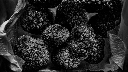 Black truffle, crystalline carbon texture, black truffle mushroom in ice crystals, frozen storage,...
