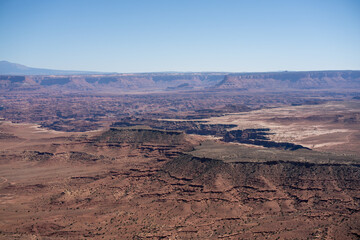 beautiful red, brown and yellow rock formations in a collection of giant natural canyons, Utah USA