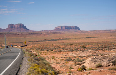 red, brown, and yellow rock formations of hematite, iron oxide in Monument Valley, Arizona USA