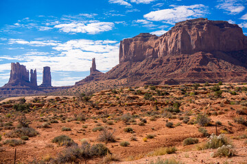 red, brown, and yellow rock formations of hematite, iron oxide in Monument Valley, Arizona USA