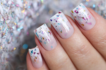 Aquarium winter manicure with glitter.