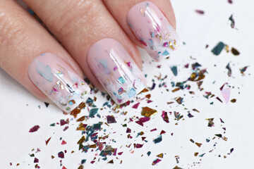 Aquarium winter manicure with glitter.
