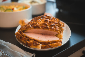 sliced crusty roast served on a platter