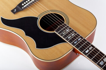 Obraz premium Musical instrument - Fragment western acoustic guitar pickguard closeup