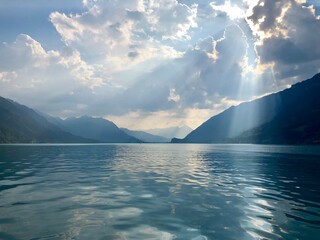 Sunburst streaming from coulds over Lake Thun