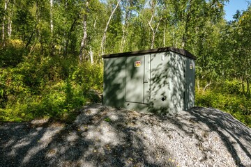 Electrical transformer station providing power in norwegian forest