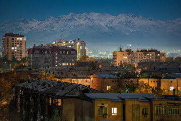 Naklejka premium Bishkek city at night and mountains