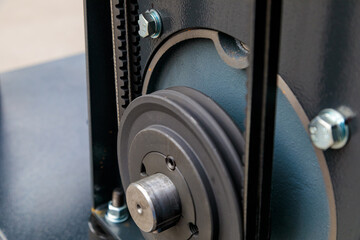 Close-up of timing belt and pulley system ensuring smooth operation