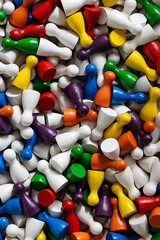 Playful Patterns: Colorful gamefigurines on a white dominant background
