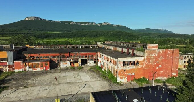 Vandalized Fascade Falling Apart Ugly Building Overlooking Stunning Canyone Cliff Forest Landscape
