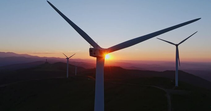 Vibrant Landscape Wind Generators Spinning Fast Setting Sunset In The Background Buzludha Monument Central Bulgaria Still Shot