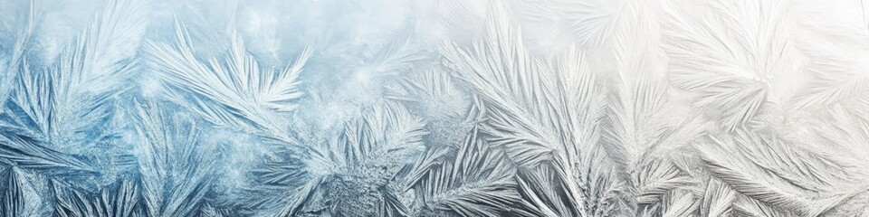 Beautiful ice crystals forming a delicate frosty pattern on a glass surface, creating a magical winter wonderland scene with ample copy space for text or design elements, banner