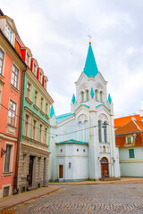 Obraz premium Old street in old Riga. The city is capital of Latvia that is well known to be a very popular tourism destination in the Baltic region