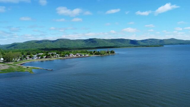 Aerial drone view of Pointe‑&agrave;‑la‑Croix and the Mi&rsquo;gmaq community of Listuguj along the Restigouche River in the Gasp&eacute; region of Quebec, Canada.