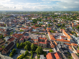 Obraz premium Lund, Sweden - 12 June 2024: aerial view of Lund city centre with Mårtenstorget in the foreground and Lund Cathedral in the background