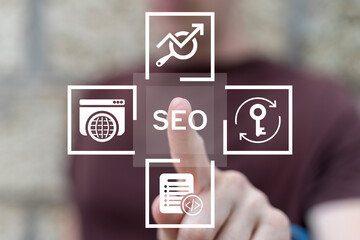 Developer working on virtual touch screen clicks text: SEO. SEO (Search Engine Optimization)...