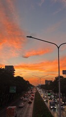 sunset over the city. Blue-orange sky in the evening in Bangkok Traffic jams on the roads in Bangkok, Thailand