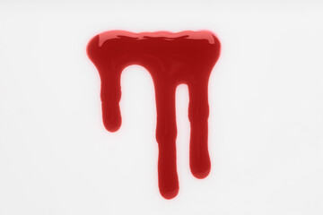 Stain of blood on white background, top view