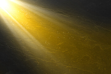 Ray of bright divine light in darkness