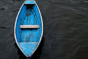 Obraz premium Closeup of a Blue Rowboat in Dark Waters with Rustic Vibe : Generative AI
