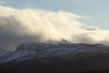 Сlouds over the mountain during golden hour