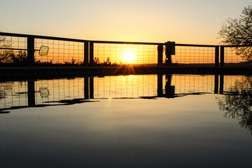 sunset over the pool