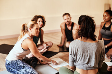 Studio, group and people with listening for yoga, mindfulness and holistic progress with feedback....