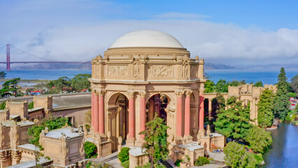 The grand Palace of Fine Arts with the Golden Gate Bridge in the background, an architectural...