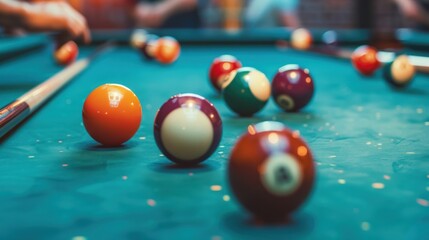 Close-up of billiard balls on a green felt pool table