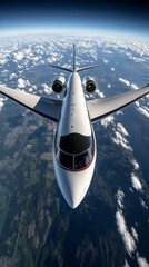 Private jetplane flying above clouds. Beautiful sunset sky.