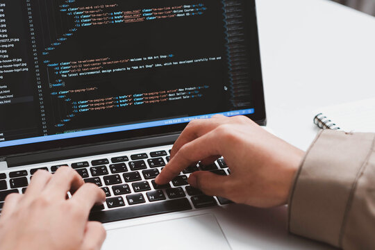 Digital technology, software development concept. Developing programmer, software developer coding computer code on laptop computer. Perfect for coding, IT solutions, applications, coding javascript