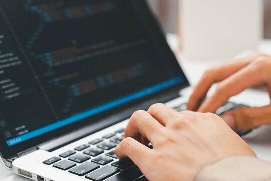 Digital technology, software development concept. Developing programmer, software developer coding computer code on laptop computer. Perfect for coding, IT solutions, applications, coding javascript