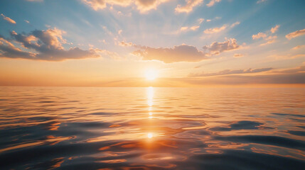 Obraz premium A Serene Sunset Over the Ocean, with Vibrant Colors Reflecting on the Water as Soft Clouds and Sun Rays Break Through, Creating a Peaceful, Tranquil Atmosphere.
