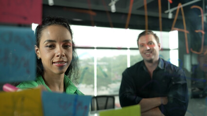 Professional business people discuss about creative marketing idea in modern office. Business team...