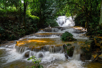 Obraz premium beautiful waterfall in the forest in tuyen quang, vietnam