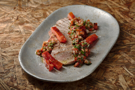 Gourmet Meal on Rustic Table