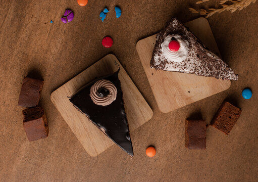 Chocolate pastry on wooden trey