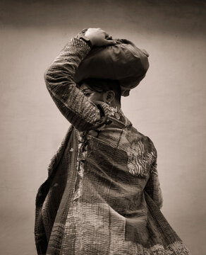 Man posing in sari and a pagri