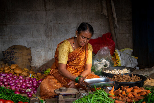 Old woman selling vegetable
