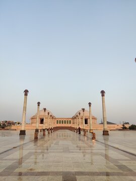 Shot of Pillar and dome building with clear blue sky