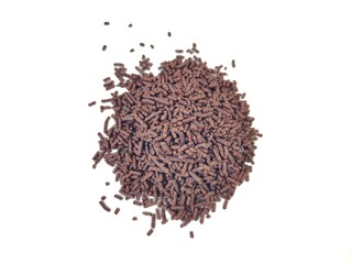 A top-down view of a heap of chocolate truffles, isolated on white background.