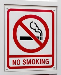 No Smoking Sign, An red road sign with cigarette icon and not symbol with text No Smoking