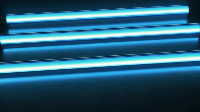Three blue light tubes are arranged in a row on a dark surface